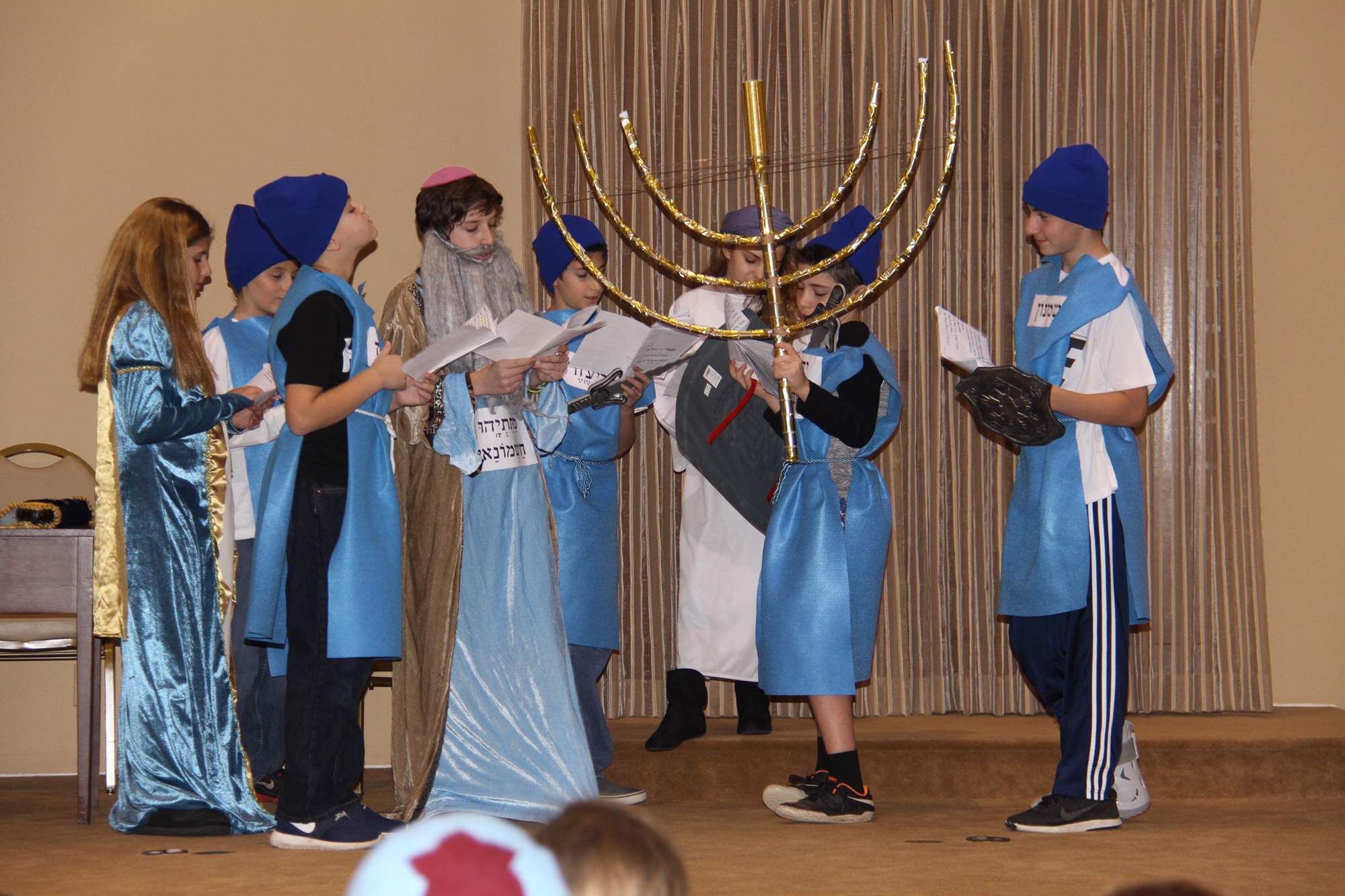 Religious School students performing a Hanukah play at MJCBY