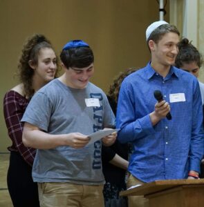 MJCBY teens participating in Minyonaire, leading a program in the sanctuary.